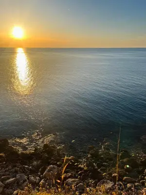 a sunset over a body of water at Casa a Mare La Stalletta in Palermo
