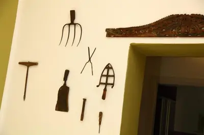a wall with different types of tools on it at Vacanze Palermitane in Palermo