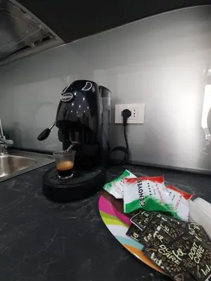 a snowboard sitting on a counter next to a mixer at Private House 14 Palermo in Palermo