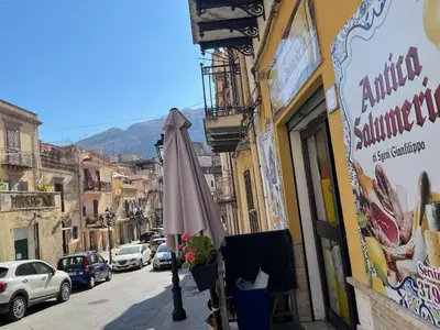 an umbrella sitting on the side of a street at Panoramica Via Villa in Carini