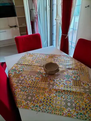 a table with a plate on top of it at Ciuridda mia in Palermo