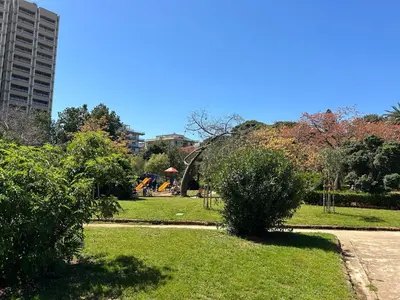 a park with a playground in the background at SiSo Home in Palermo