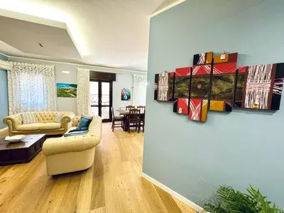 a living room with a couch and a table at Ventu di Sciroccu in Cinisi