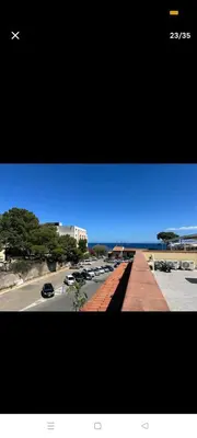 a view of a parking lot with cars parked at La casa di maretta,Mondello in Palermo