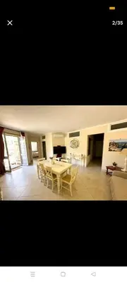 a dining room with a table and chairs at La casa di maretta,Mondello in Palermo