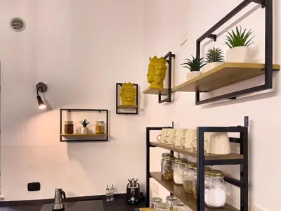 a room with shelves with plants on the wall at Flat44 in Palermo