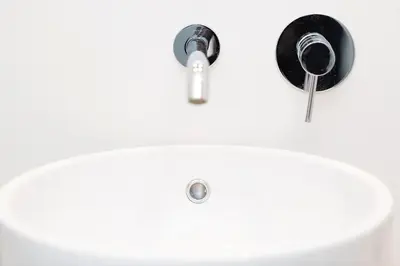 a close up of a bathroom sink with aaucet at Massim'home in Palermo