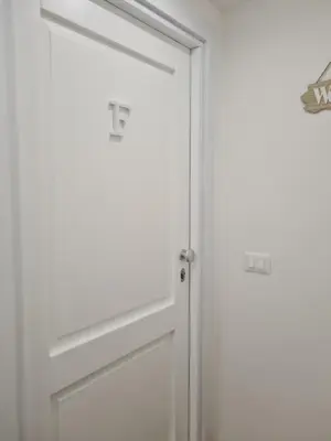an image of a door with the letter f on it at M&F Home in Palermo