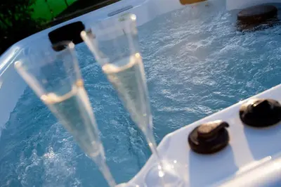 a tub filled with water with two objects in it at Villa Laura in Balestrate
