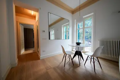 a dining room with a table and chairs at studio 338 in Palermo