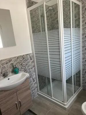 a bathroom with a shower and a sink at Miramare in Balestrate