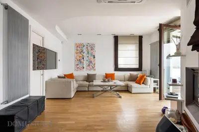 a living room with a couch and a table at Villa Maurino by DomuSicily in Mondello