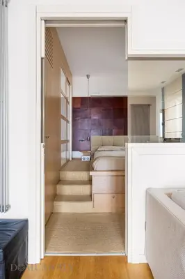 a bedroom with a bed and a sliding glass door at Villa Maurino by DomuSicily in Mondello