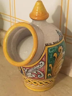 a vase with a handle on top of it at Aurora e Andrea San Vito lo Capo in San Vito lo Capo