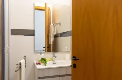 a bathroom with a sink and a mirror at Casa Dolce Casa in Castellammare del Golfo