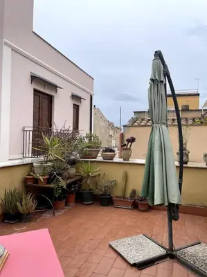 a shelf with pillows on it in a room at Cozy 2BR in the heart of Palermo in Palermo