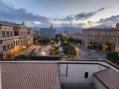 a view of a city with a street and buildings at Mangano Suites in Palermo