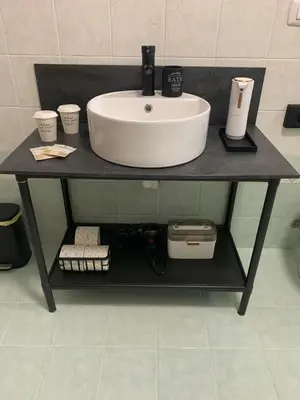 a bathroom counter with a sink and some cups on it at A CASA DI GRACE in Palermo
