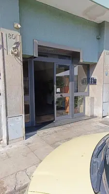 an entrance to a building with a glass door at A CASA DI GRACE in Palermo