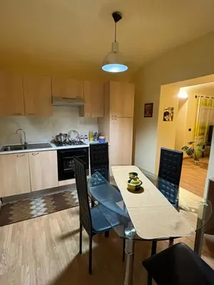 a kitchen with a table and chairs in a room at Casa Amarilla in Palermo