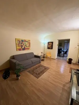 a living room with a couch and a table at Casa Amarilla in Palermo