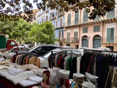 a group of clothes on display on a street at Domus Vetriera in Palermo