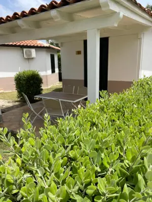 a porch of a house with a patio at Soleada Club in Campofelice di Roccella
