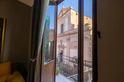 a view of a building from a window at Le radici di Gallidoro in Palermo