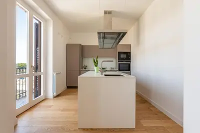 a view of a balcony with a table and chairs at Oretea Apartment with Terrace by Wonderful Italy in Palermo