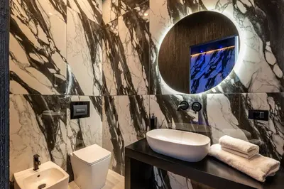 a bathroom with a sink and a mirror at Amari120Suite&Spa in Palermo