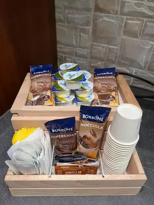 a wooden tray filled with different types of food at Ninohouse in Palermo
