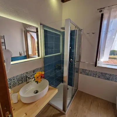 a bathroom with a sink and a shower at Casa Kyla in Palermo