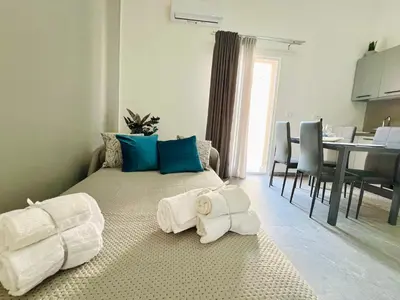 a bedroom with a bed with towels on the floor at Soevi Appartamenti in Carini