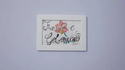 a picture of a hello october sign on a wall at Umàri Rooms in Castellammare del Golfo