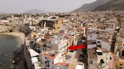 an aerial view of a city with buildings at Umàri Rooms in Castellammare del Golfo