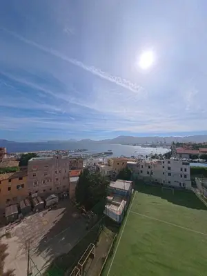 a view of a city with a tennis court at Il Balcone sul mare - free parking & relax in Palermo