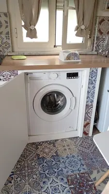 a washing machine in a laundry room with a window at Virginia Holiday Home in Mondello