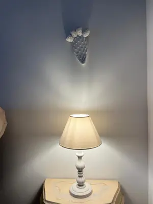 a lamp on a table in a room at Il Fico d'India in San Vito lo Capo