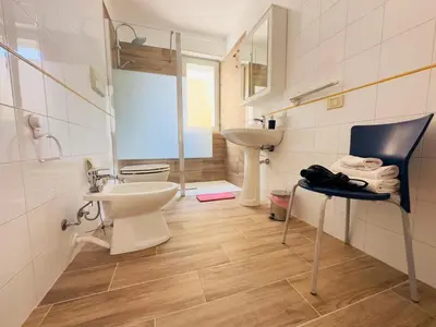 a bathroom with a toilet and a sink at Balestrate Mare Centro Wi-Fi Self Check-in Aria Condizionata in Balestrate