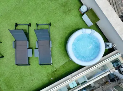 an overhead view of a swimming pool and house at Marina Rooftop Exclusive View in Palermo