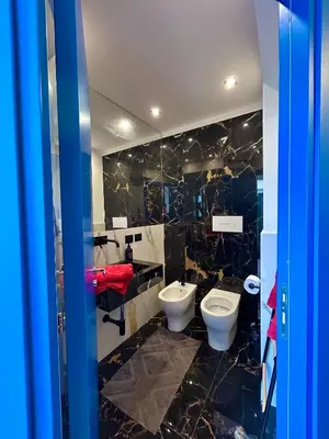 a bathroom with a toilet and a bidet at Zagara in Palermo