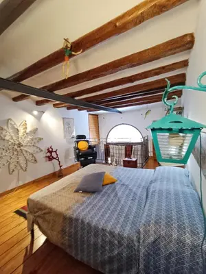 a bedroom with a large bed in a room at Casuzza del mare in Castellammare del Golfo