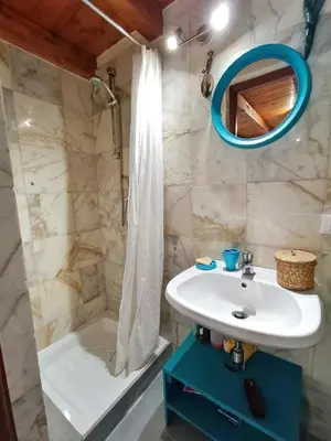 a bathroom with a sink and a shower and a tub at Casuzza del mare in Castellammare del Golfo