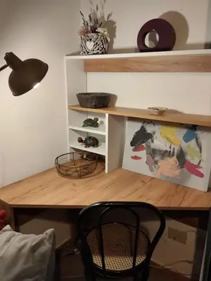 a bedroom with a large bed and a window at House Ninì in Palermo