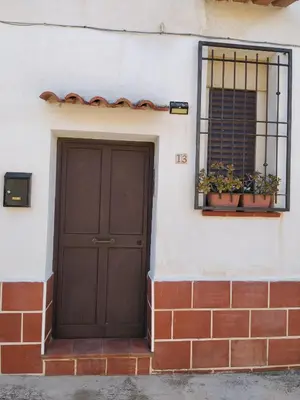a bathroom with a toilet and a sink and a tub at House Ninì in Palermo