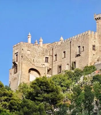 a view of a city with mountains in the background at La Castellana Apartments, vista panoramica sul mare, nel cuore storico di Carini, a due passi dal Duomo e dal castello in Carini