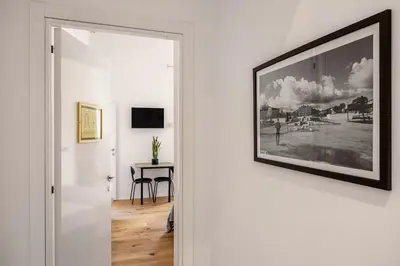 a picture hanging on a wall in a room at Azizò in Palermo