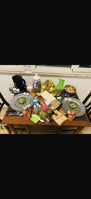 a table with plates of food on top of it at Casa ivan in Palermo