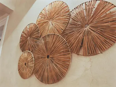 four wooden plates hanging on a wall at Casa Vacanze Imera House in Palermo