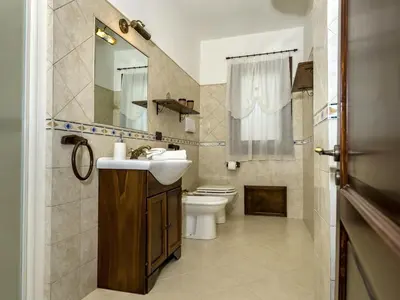 a bathroom with a sink and a toilet at Villa Flavia by Interhome in Castellammare del Golfo